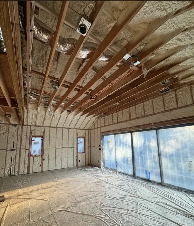 Interior walls and ceiling insulated with spray foam during new construction in Sulphur Springs